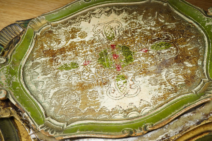 Five Venetian trays, three carved and painted wood examples, largest 57cm wide